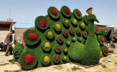 <b>洛陽孔雀開屏仿真綠雕-仿真綠雕工藝品的制作方</b>